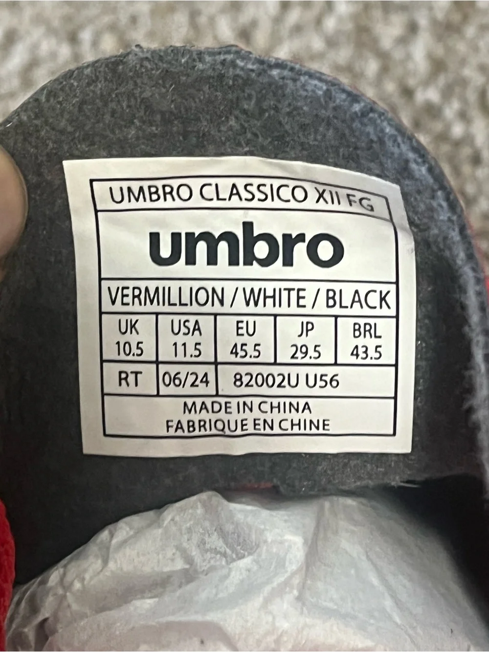 Umbro Red and Black Soccer Cleats with White Logo